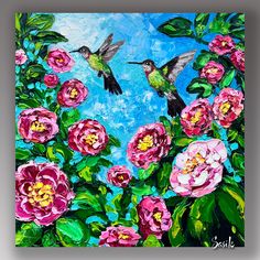 two birds flying over pink flowers on a blue background