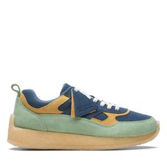 Model Name: Lockhill Kith Ronnie Fieg Model Number: 26170103 Material: Leather Color: Blue Green Condition: New With Box Width: Medium (D, M) The Clarks Story Began In England In 1825 When The Clarks Brothers, Cyrus And James, Created Their First Pair Of Shoes. In 1977, Their Business Expanded Into The United States And Soon Acquired The Hanover Shoe Company And Bostonian Shoe Company. Today, Clarks Continues To Strive For Superior Footwear With Innovative New Techniques And Materials, All While Blue Sporty Sneakers With Flat Heel, Blue Low-top Sneakers With Removable Insole, Blue Sneakers With Rubber Sole, Blue Textured Slip-on Sneakers, Casual Blue Sneakers With Vibram Sole, Blue Suede Sneakers With Removable Insole, Modern Blue Sneakers With Rubber Sole, Blue Suede Sneakers With Round Toe, Blue Suede Sneakers With Textured Sole