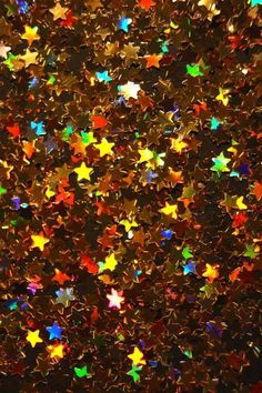 many colorful stars are scattered in the sky