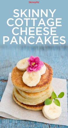 skinnyy cottage cheese pancakes with banana slices and pink flower on blue wooden background, text reads skinnyy cottage cheese pancakes