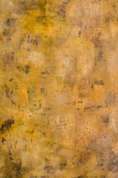 an abstract painting with yellow and brown colors