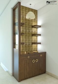 an empty room with some shelves and lights on the wall above it, in front of a mirror