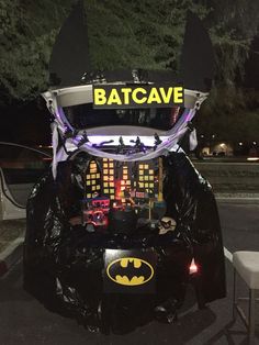 a batcave car is decorated with lights and decorations