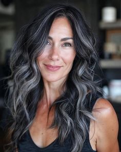 Brunette And Grey Balayage, Natural Gray Highlights, Natural Gray Highlights On Dark Hair, Dark Hair With Blonde Around Face, Growing Out Grey With Dark Hair, Dark Hair Transition To Grey, Black Streaks In Grey Hair, Lightening Dark Hair To Blend Gray, Blending Dark Hair With Grey