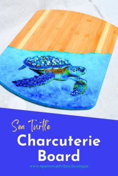 a wooden cutting board with a painting of a turtle on it and the words sea turtle char