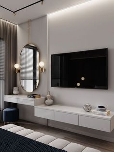 a bedroom with a large mirror on the wall and a television mounted to the wall