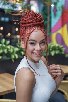 Elevate your style with this stunning red braided updo, perfect for any occasion. This trendsetting hairstyle combines the beauty of braided hairstyles for black women with a vibrant pop of color, making it an easy choice for 2024. The intricate twists are beautifully adorned with beads, adding an elegant touch to this quick and chic look. Embrace your natural beauty with this eye-catching hairstyle! #braidedhairstylesforblackwomen #red #braidedhairstylesforblackwomen Red Braided Hairstyles, Color Making, Natural Beauty