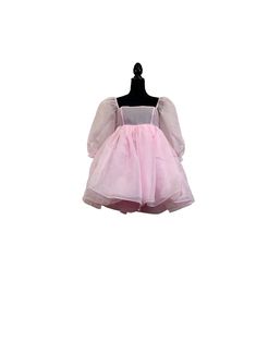 Pink Organza Babydoll Dress This is the babydoll dress for a dramatic, pink-loving princess. It's made entirely of high-quality sheer organza fabric, which makes it the puffiest, most dramatic babydoll dress in all of our collections! The skirt is made of three layers and the top is double-layered. Both the sleeves and top maintain their sheerness. All of the seams are inside the layers to prevent fraying and itchiness. The elastic at the bottom of the sleeve creates a ruffle effect at the elbow. It closes at the back with an invisible zipper. Model is 5'2" wearing a size small. Short Babydoll Dress, Organza Fabric, Pink Princess, Kind Heart, Babydoll Dress, Color Rosa, Invisible Zipper, Pink Dress, Baby Dolls