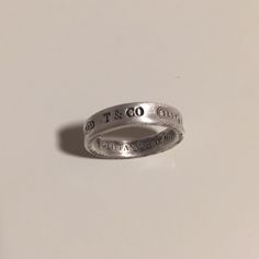 Tiffany& Co Small Ring Not Sure On The Size Or If This Was For Necklace Or Ring Is Litt Small See Photos Like Penny Size I Was Able To Clean It Is Been Found Seems To Be Good Quality And Real Tf & Co , I Can’t Price It So Feel Free To Send You Offer For It Thank You Tiffany And Co 1837 Ring, Jewelry Tiffany, Tiffany Co Jewelry, Small Ring, Ring Color, Small Rings, Tiffany & Co., Good Quality, Womens Jewelry Rings