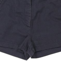 Description:Vintage Calvin Klein navy shorts, fit a UK size 8 - mid rise with a 28" waist. Size conversion: US Size: 4EU Size: 36IT Size: 40 RISE TYPE: Mid RiseWAIST: 28 inches / 71cmsINSEAM: 2 inches / 5cmsRISE: 10 inches / 25cmsGENDER: womens CONDITION: very good.STYLE: shortsERA: 1990sCOLOUR: navyFABRIC: cotton Fitted Cotton Knee-length Jean Shorts, Fitted Knee-length Cotton Jean Shorts, Navy Fitted Bottoms Short Length, Navy Fitted Short Bottoms, Classic Blue Shorts With Short Inseam, Navy Bermuda Shorts For Summer, Classic Navy Bottoms, Short Length, Navy High-waisted Shorts, Navy High Waist Shorts For Summer