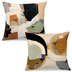 two pillows with abstract shapes on them