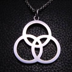 This is a Sterling silver pendant based on Bonzo's symbol used on the Led Zeppelin IV album. The pendant is 30mm across at the bottom. Comes with a... Led Zeppelin Iv, Artisan Jewelry Necklaces, John Bonham, Handcrafted Artisan Jewelry, Led Zeppelin, Zeppelin, Sterling Silver Chain, Sterling Silver Pendant, Cable Chain