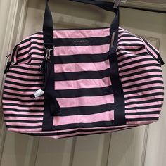 This Duffel Bag Is All You Need For That Getaway Vacay. Measures 24 Inches Across And 16 Inches Tall. Short Hand Or An Adjustable Long Handle. Bottom Measurement Is 20 Inches By 7 1/2 Pink Travel Duffle Bag With Removable Pouch, Pink Duffle Bag With Removable Pouch For Travel, Pink Travel Bag With Zipper Closure For Everyday Use, Pink Everyday Travel Bag With Zipper Closure, Everyday Pink Travel Bag With Zipper Closure, Pink Satchel Weekender Bag For Travel, Pink Duffle Bag Satchel For Travel, Pink Satchel Travel Bag For School, Pink Travel Bag With Adjustable Strap For Daily Use