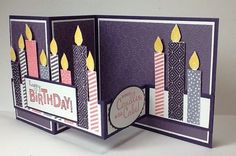 a birthday card with candles on it