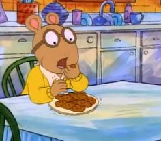 an image of a cartoon character eating food at a table with the caption that reads,