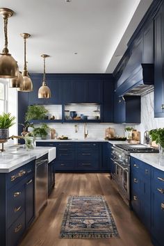 a large kitchen with blue cabinets and gold accents on the ceiling, along with an area rug that matches the hardwood flooring