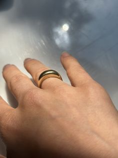 This design stemmed from my love of simple buttery gold bands, but wanting a little extra funk. It's a gold band that can hold its own, or be part of a fun stack. This is made in a very hefty 18k or 14k yellow gold band, carved to be comfortable to wear while also making a statement. It took me many many iterations to get it to this point, and I'm excited to share it with you. Probably the heaviest ring you'll ever wear. It's dome ring inspired, but with a twist. All of my pieces are handmade by me. If you like this but want a tweak, or a different size, message me and let's talk! Everyday Gold Wide Band Stackable Ring, Minimalist Gold Stackable Rings With Wide Band, Modern Gold Bands For Everyday, Modern Gold Bands For Everyday Wear, Gold Stackable Wide Band Ring, Gold Wide Band Stackable Rings For Everyday, Gold Stackable Wide Band Rings For Everyday, Everyday Gold Stackable Wide Band Rings, Adjustable Gold Wide Band Ring For Everyday