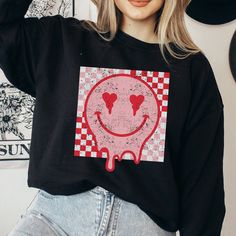 Retro Smiley Face sweatshirt, Distressed Vintage Look Smiley face, Crewneck sweatshirt, Retro smile, smile graphic sweater, valentines, melted smiley face, good vibes, positivity, Be Happy, Brahman Darlin Thank you for shopping my small business. Please message me if you have questions. This is a physical shirt that is made when you order it and shipped out to you. I do not sell my designs, they are made with love, by me to support my family's cattle ranch. If you love the design and would like Smiley Face Sweatshirt, Smile Graphic, Retro Smiley Face, Good Vibes Shirt, Smile Smile, Cattle Ranching, Heart Face, Graphic Sweaters, Smiley Face