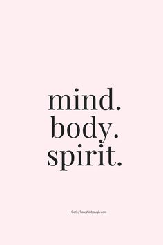 the words mind body spirit are in black and white on a pink background with an image of