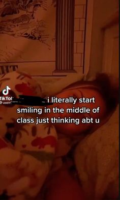 someone is sleeping in their bed with the caption that reads, i literally start smiling in the middle of class just thinking about u