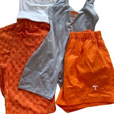 Show your team pride on game day with these Tennessee Woven Shorts! Made with a comfortable polyester blend, these shorts are perfect for cheering on your favorite college team. Stay cool and stylish while showing your support. Go Volunteers! Woven Shorts, College Team, Brand Ambassador, Stay Cool, Auburn, Game Day, Vintage Collection, Tennessee, Orange Color