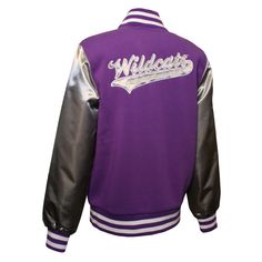 a purple and silver jacket with the word wildcats on it's chest, in front of a white background