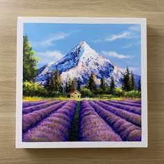 a painting of a lavender field with a mountain in the background