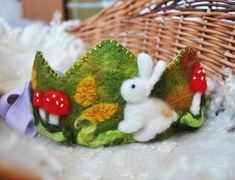 Felted birthday crown, made of wool using the technique of wet and needle felting. The woodland crown will suit both a boy and a girl. A wonderful accessory that will  save the memory of sweet date of Birthday of your kid. Made from handmade wool felt. The layer is made of acrylic non itching felt.   Hand sewn with a secure cotton finished ribbon. Please note that this is handmade item and each crown may differ from the one in the photo Size of felted crown without ribbon 30X10  cm You can find my other felted crown her https://www.etsy.com/listing/864752262/waldorf-unicorn-birthday-crown-rainbow?ref=shop_home_active_2&frs=1 Felted Crown, Waldorf Birthday Crown, Waldorf Crown, Waldorf Birthday, Woodland Crown, Felt Crown, Custom Crown, Toddler Girl Gifts, Bunny Birthday