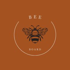 a bee logo on a brown background