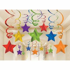 multicolored stars and swirls hanging from the ceiling