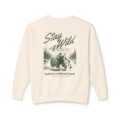 Katmai Alaska National Park Sweatshirt, Granola Girl Aesthetic Crewneck, Front & Back Graphic Pullover, Outdoorsy Style . Comfort Colors Crewneck Details: Medium-heavy fabric Relaxed fit Sewn in twill label OEKO-TEX certified low-impact dyes CARE INSTRUCTIONS: All items are machine washable, inside out, using cold water. Please hang to dry. Do not bleach or dry clean. SHIPPING NOTE: More than 1 item in an order may ship separately, so you can receive products as soon as they are ready, don’t be Winter Graphic Print Cream Tops, Winter Cream Graphic Print Tops, Winter Cream Tops With Graphic Print, Beige Crew Neck Sweatshirt With Graphic Print, Beige Graphic Print Top For Winter, Cream Crew Neck Sweater With Graphic Print, Cream Graphic Print Crew Neck Sweater, Relaxed Fit Cream Sweater With Letter Print, Cream Winter Top With Letter Print