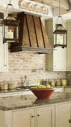 a kitchen with an oven, sink and counter tops in it's center island