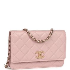 This Wallet on Chain is in pink caviar with gold tone hardware and has a front flap with a textured CC emblem, and a long gold tone metal and pink leather chain.The interior is lined in pink leather and grosgrain fabric and features a top zipper pocket under flap, a slit front pocket, a zipper compartment with leather pull, and an open pocket with six credit card slots.Collection: 22BOrigin: FranceCondition: New and never worn Accompanied by: Chanel box, Chanel dustbag, carebook, felt and ribbon Chanel Classic Wallet On Chain, Chanel Wallet On Chain, Chanel Box, Wallet On Chain, Burberry Shoes, Chanel Wallet, Leather Pulls, Vuitton Bag, Leather Chain