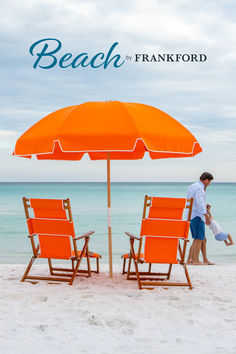 two chairs and an umbrella on the beach with text overlay reads, beach by frank ford