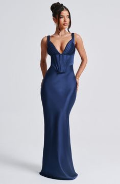 Say hello to your dream fit, Shae in Navy. This gorgeous maxi is ultra feminine, cut from our premium bias cut satin that skims over the body for a stunning silhouette. The corseted body has in built boning for a cinched waist, and pretty pleated cups with adjustable straps for your perfect fit. Keep the look sleek with a chic messy bun and tonal heels.Ã‚Â 



Colour: Navy.

Premium non-stretch satin.

Fully lined.

Boned bodice with corset overlay.

Pleated cups.

Fan shape adjustable straps. Chic Messy Bun, Award Dresses, Homecoming Dresses Corset, Midi Dress Wedding Guest, Prom Inspo, Gorgeous Maxi Dresses, Boned Bodice, Ultra Feminine, Maxi Dress Sale