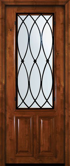 a wooden door with a decorative glass window