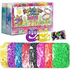 the rainbow loom box is filled with assorted beads