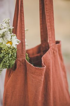 "Natural linen tote bag perfect for everyday use. Beautifully made of high-quality linen that feels lovely to the touch. Linen is environmentally friendly, durable, and looks better and better with age. Which is your favorite color? Terracotta / Olive / Ocean Standard bag size: (as in the photos) 40x42x10 cm / 16x17x4\" Handles size: (strap drop length) 34 cm / 13\" Larger bag size: 50x44x10 cm / 20x17x4\" Handles size: (strap drop length) 40 cm / 16\" *Custom size available. Please feel free to Tod Bag, Terracotta Linen, Linen Tote Bag, Handmade Tote Bag, Casual Tote Bag, Farmers Market Bag, Eco Tote Bag, Tote Bags Handmade, Summer Bag