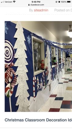 a christmas classroom decoration idea is displayed on the wall in front of an empty hallway