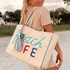 Double Shoulder Straps Interior Pockets Oversized Tassle Embellishment Snap Closure Canvas Like Fabric Hand Wash 21” x 12" Ships from Indianapolis, IN Colorful Tote Bags, Boho Tote Bag, Beach Necessities, Boho Tote, Summer Tote Bags, Summer Tote, Oversized Tote, Blue Beach, Perfect Tote Bag