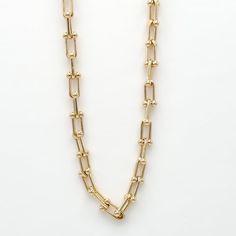 The Ryker Necklace, a timeless piece, embodies luxury and sophistication. Crafted from 18K gold filled materials, this 8mm bead link chain features a lustrous finish and a versatile 18-inch length with a 2" extender. Its refined elegance makes it a must-have for those who appreciate quality craftsmanship and style. Perfect for any occasion, it's sure to make a statement. 18" with 2" extension 18k gold filled demi-fine Gold Medallion Necklace, Gold Medallion, Bold Accessories, Ear Stack, Stacked Earrings, Medallion Necklace, Chunky Beads, Gold Wood, Chain Link Necklace