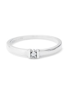 The 1/8 inch wide sterling silver band is set with a cubic zirconia of your choosing and surrounded on either side by a simple and stylish bar design.Product Care : Moisture will tarnish your jewelry. Avoid all water, lotions, and perfumes. Clean with a dry cloth. Never use jewelry cleaner or polishing cloths. To limit wear and tear take a day off and store in a safe dry place.Material : Rhodium-Plated-Silver Bootie Sandals, Straw Bags, Sneaker Slippers, Baby Boy Shoes, Jewelry Cleaner, Sterling Silver Bands, Small Accessories, Design Product