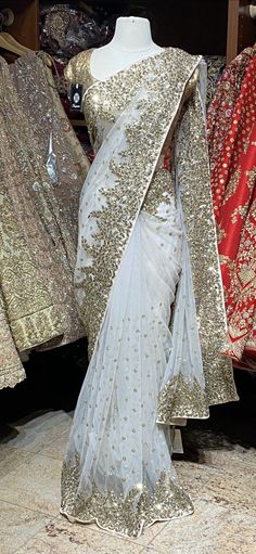 White and gold shimmer sequence saree w/ unstitched blouse. Fabric: Net Ready to Ship! White Net Saree, Saree Beautiful, Sequence Saree, Designer Sarees Wedding, Saree Wearing Styles, Bridal Sarees South Indian, Fancy Sarees Party Wear, Traditional Indian Dress, White Saree