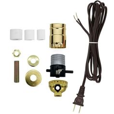 an assortment of brass fittings and accessories for a water heater, including the hose