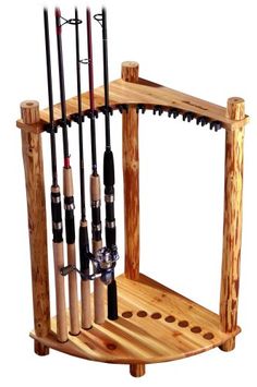 a wooden rack with fishing rods and poles attached to the back of it's holder