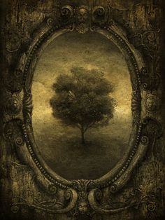 a black and white drawing of a tree in a frame with an ornate border around it