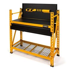 a yellow and black work bench sitting on top of a metal shelf next to a white background