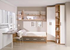 a bedroom with a bed, desk and shelves