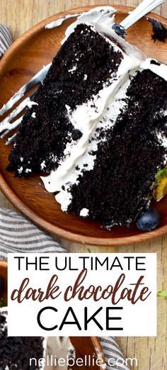 the ultimate dark chocolate cake with white frosting and blueberries on top is shown