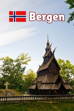 an old wooden church with the word bergen on it's front and side